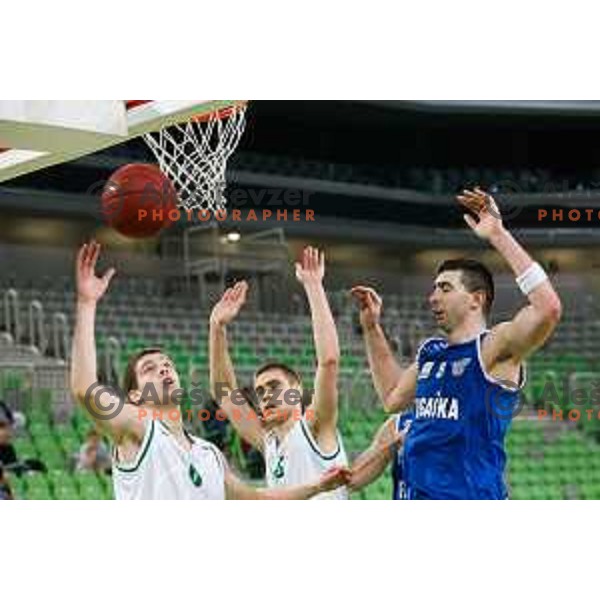 Paolo Marinelli, Jaka Brodnik of Union Olimpija and Jozo Brkic of Rogaska in action during basketball match between Union Olimpija and Rogaska of Telemach Leauge, played in Arena Stozice, Ljubljana, Slovenia on March 19, 2014