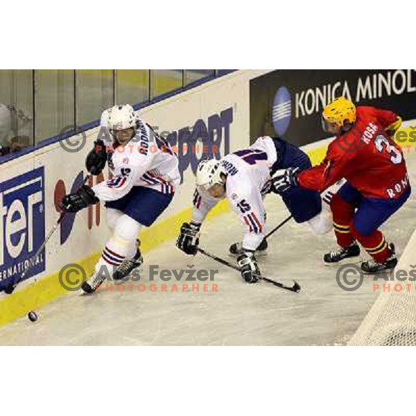 DAvid Rodman (12) and Muric at match Slovenia- Romania at World Championship Division 1 group B in Ljubljana.Photo by Ales Fevzer 