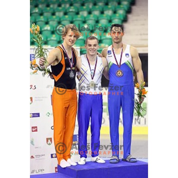 Alen Dimic of Slovenia competing at Parallel Bars during Artistic Gymnastics World Challenge Cup in Hala Tivoli, Ljubljana, Slovenia on April 20, 2014