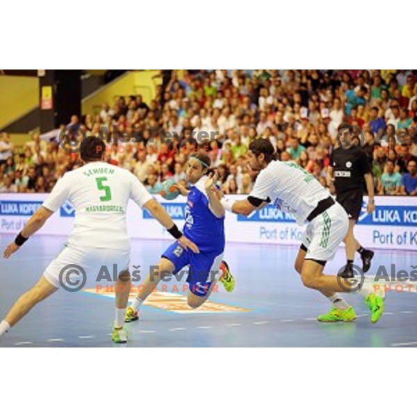 Dean Bombac of Slovenia in action at qualification match for Qatar 2015 World Handball Championships between Slovenia and Hungary, played in Red Hall, Velenje on June 15, 2014