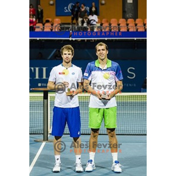 Blaz Kavcic (L) of Slovenia, winner and Gilles Muller (R) of Luxembourg after Tilia Slovenia Open-ATP Challenger Tour, played in SRC Marina, Portoroz, Slovenia, on July 13, 2014
