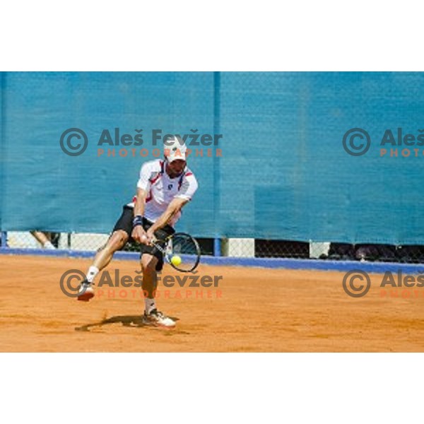 Dino Marcan of Croatia in action during first qualifying match of 25. Vegeta Croatia Open Umag-ATP World Tour, played in ATP Stadion Umag, Umag, Croatia, on July 19, 2014
