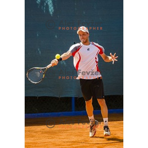 Dino Marcan of Croatia in action during first qualifying match of 25. Vegeta Croatia Open Umag-ATP World Tour, played in ATP Stadion Umag, Umag, Croatia, on July 19, 2014