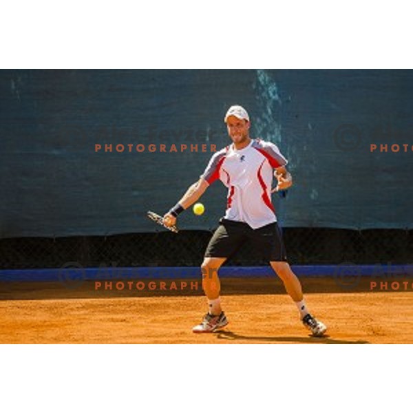 Dino Marcan of Croatia in action during first qualifying match of 25. Vegeta Croatia Open Umag-ATP World Tour, played in ATP Stadion Umag, Umag, Croatia, on July 19, 2014