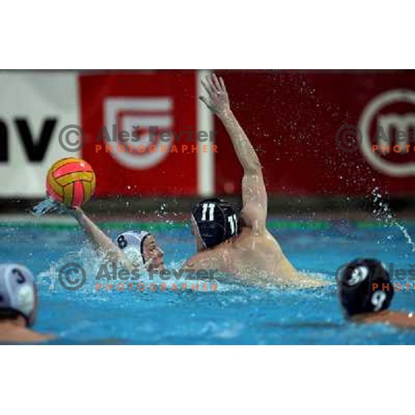 Campbell (11) tries to bolck Merlak (8)at qualification match Slovenia-Great Britain for European Junior Championship 2007 played in Kranj. Slovenia won 10:7. Photo by Ales Fevzer 
