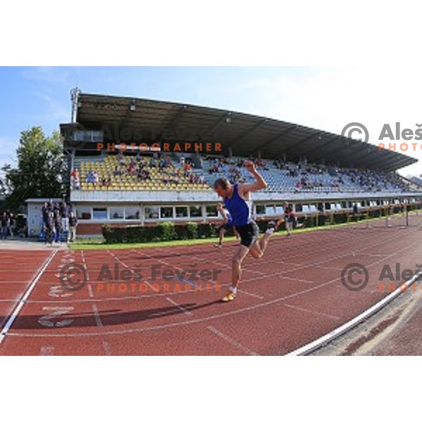 in action during first day of Slovenian National Athletics Championships in Celje on August 2, 2014