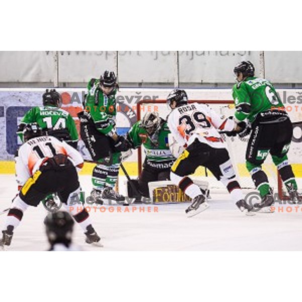 David Planko, Andy Chiodo in action during ice hockey match Olimpija - Znojmo, EBEL League, Tivoli , Ljubljana, 19.09.2014