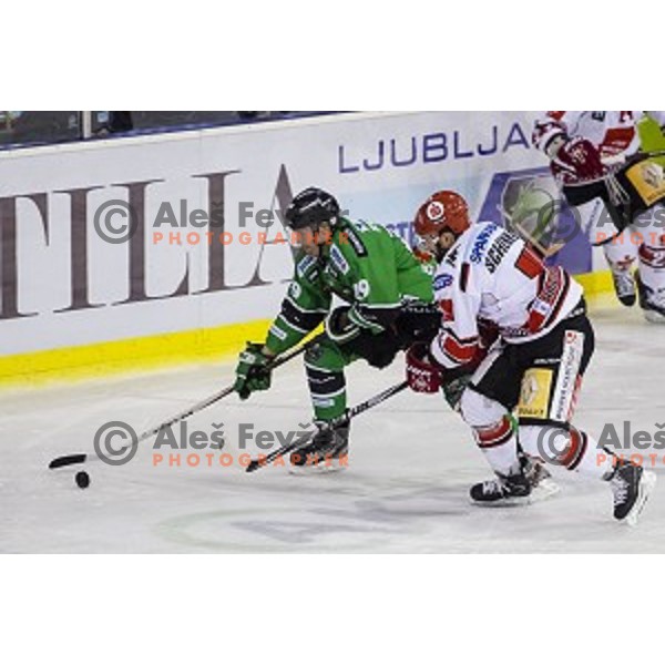 Anze Ropret in action during ice hockey match of 6th round of EBEL League in Season 2014/15 between HDD Telemach Olimpija and HC TWK Innsbruck, played in Tivoli Hall, Ljubljana, Slovenia, on September 28, 2014