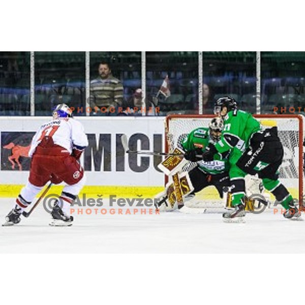 Matthias Trattnig, Andy Chiodo and Tadej Snoj of Olimpija in action during ice hockey match of 10th round of EBEL League in Season 2014/15 between HDD Telemach Olimpija and EC Red Bull Salzburg, played in Tivoli Hall, Ljubljana, Slovenia, on October 12, 2014