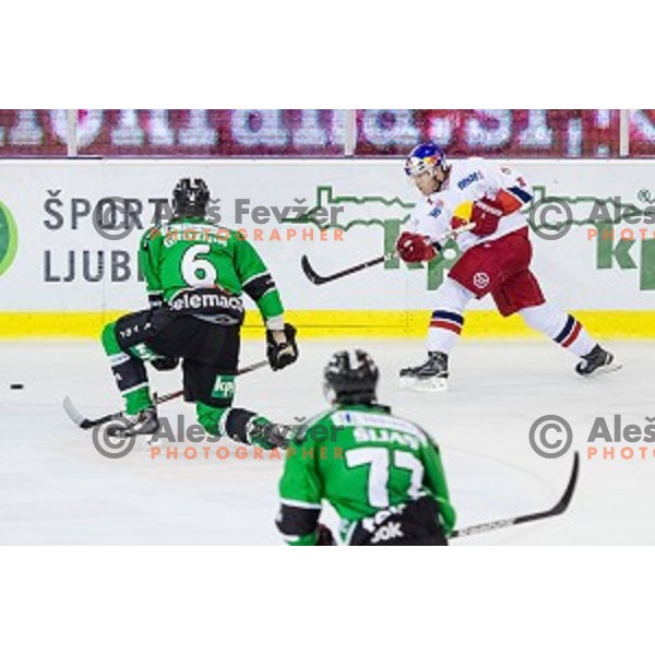 Bostjan Groznik, Ivan Sijan of Olimpija and Brian Fahey of Salzburg in action during ice hockey match of 10th round of EBEL League in Season 2014/15 between HDD Telemach Olimpija and EC Red Bull Salzburg, played in Tivoli Hall, Ljubljana, Slovenia, on October 12, 2014