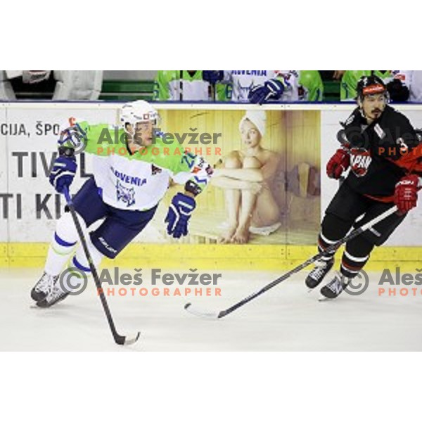 Jan Urbas of Slovenia in action during ice-hockey match Slovenia-Japan at Euro Ice Hockey Challenge Tournament in Hala Tivoli, Ljubljana, Slovenia on November 6, 2014