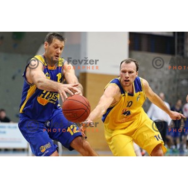 Goran Jagodnik of Hopsi Polzela and Boris Jersin in action during Telemach league basketball match Sencur Gorenjska gradbena druzba-Hopsi Polzela, played in Sencur, Slovenia on November 8, 2014
