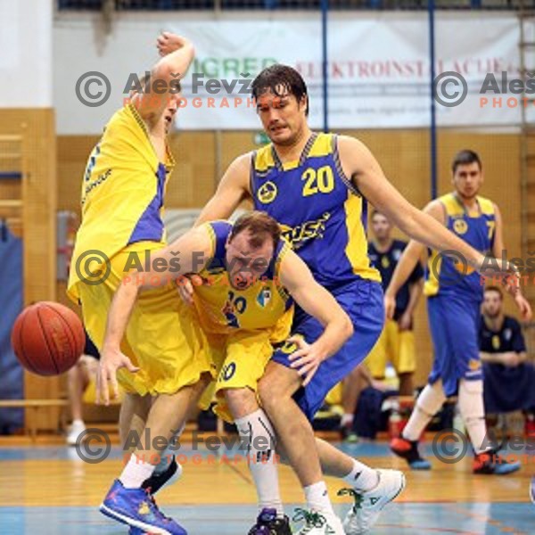 Uros Godler of Hopsi and Boris Jersin of Sencur GGD in action during Telemach league basketball match Sencur Gorenjska gradbena druzba-Hopsi Polzela, played in Sencur, Slovenia on November 8, 2014