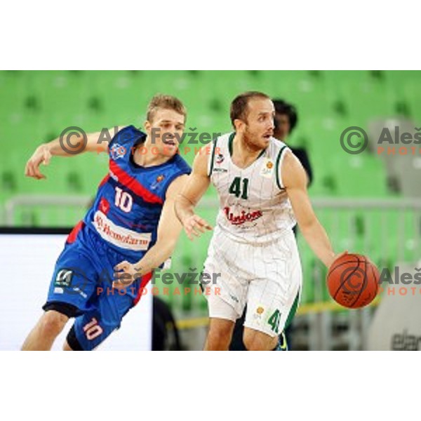 Marko Marinovic of Union Olimpija in action during ABA league basketball match between Union Olimpija Ljubljana and Igokea Aleksandrovac, played in Stozice, Ljubljana, Slovenia on November 14, 2014