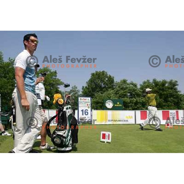 Gojcic watches tee shot of Sebastian Fernandez during second round of BA-CA Open in Fontana, Austria 8.June 2007. Photo by Ales Fevzer 