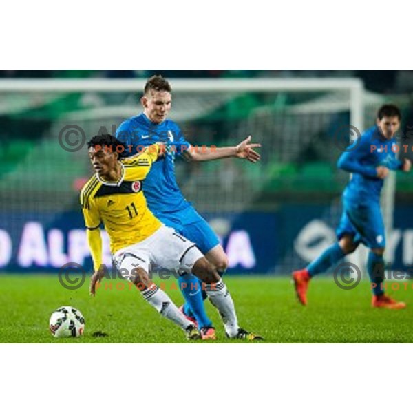 Juan Cuardado, Rajko Rotman in action during football match Slovenia - Colombia, Src Stozice, Ljubljana, Slovenia, 18.11.2014