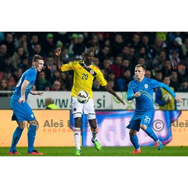 Rajko Rotman, Adrian Ramos, Martin Milec in action during football match Slovenia - Colombia, Src Stozice, Ljubljana, Slovenia, 18.11.2014