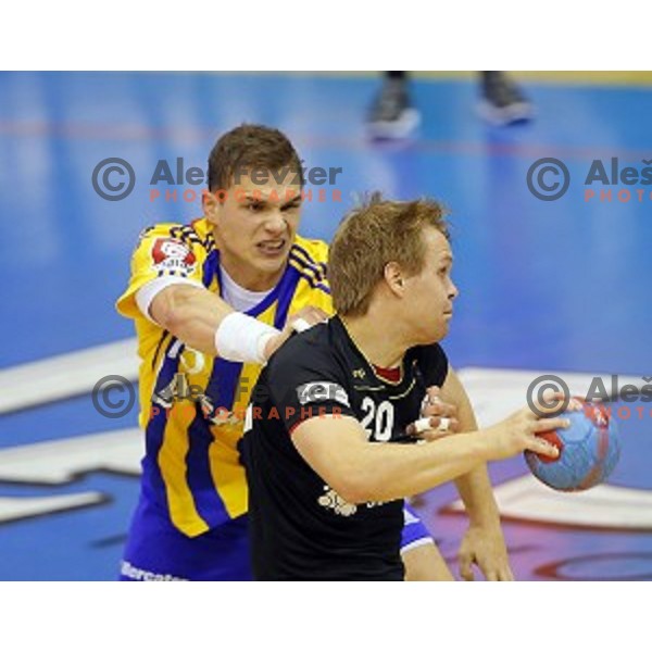 Vid Poteko of Celje PL and Stas Skube of Gorenje Velenje in action during handball match Celje PL-Gorenje Velenje in round 11 of 1.NLB leasing league, played in Zlatorog Hall, Celje, Slovenia on November 19, 2014