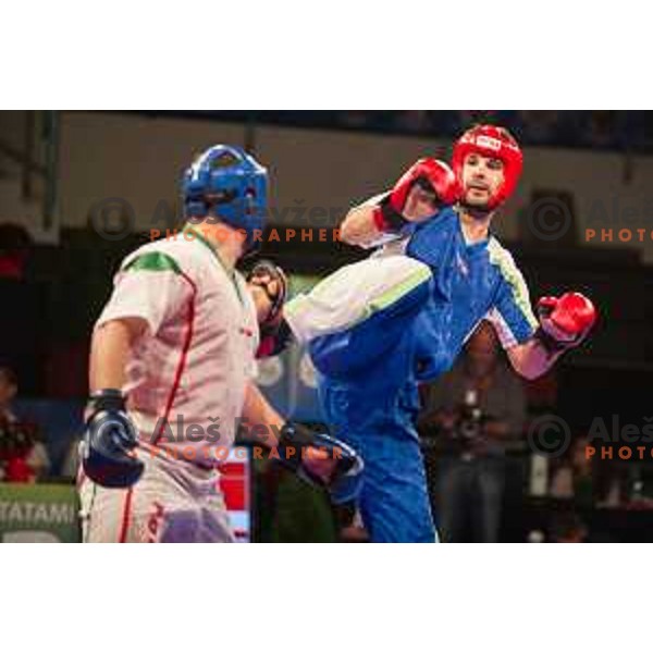 Amir Sinanbegovic of Slovenia fights against Kriztan Jarozkievicz of Hungary during Kickbox European championship, Maribor, Tabor Hall, 21.11.2014