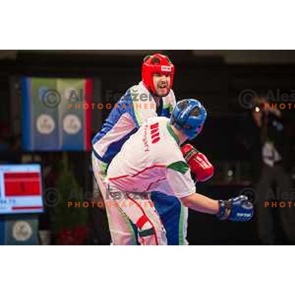 Amir Sinanbegovic of Slovenia fights against Kriztan Jarozkievicz of Hungary during Kickbox European championship, Maribor, Tabor Hall, 21.11.2014