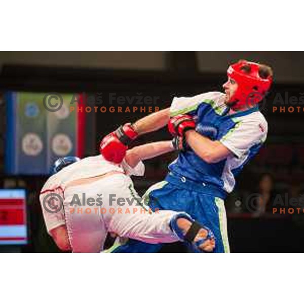 Amir Sinanbegovic of Slovenia fights against Kriztan Jarozkievicz of Hungary during Kickbox European championship, Maribor, Tabor Hall, 21.11.2014