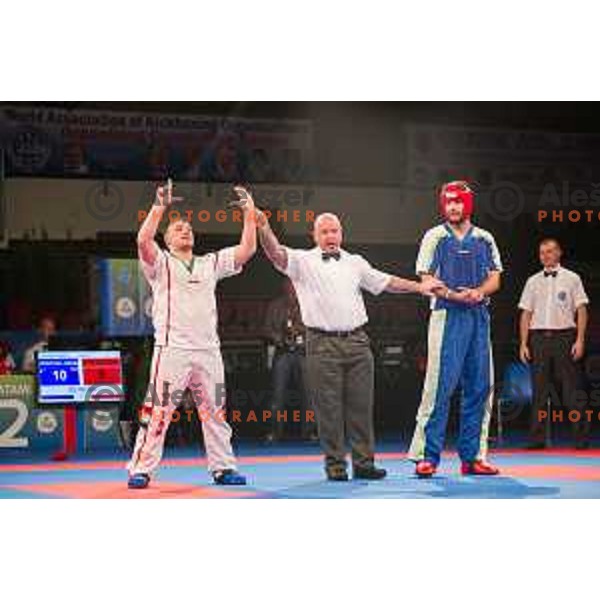 Amir Sinanbegovic of Slovenia fights against Kriztan Jarozkievicz of Hungary during Kickbox European championship, Maribor, Tabor Hall, 21.11.2014