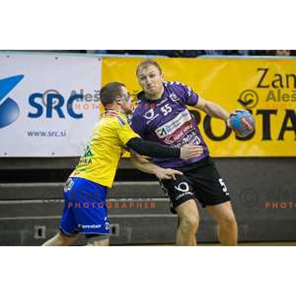 Ziga Mlakar in action during handball match Maribor Branik - Celje pivovarna Lasko, Maribor 3.12.2014, Tabor Hall