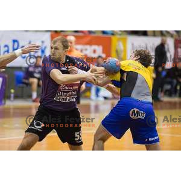 Ziga Mlakar in action during handball match Maribor Branik - Celje pivovarna Lasko, Maribor 3.12.2014, Tabor Hall