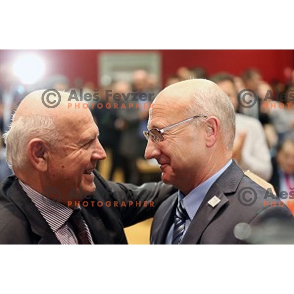 Janez Kocijancic and Bogdan Gabrovec, new president of Slovenian Olympic Committee after election on General Assembly of OKS in hotel Union, Ljubljana on December 16, 2014