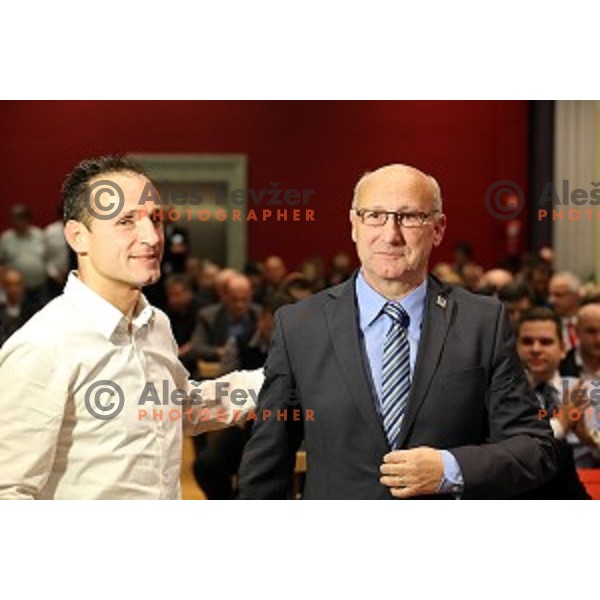 Tomaz Barada and Bogdan Gabrovec, new president of Slovenian Olympic Committee after election on General Assembly of OKS in hotel Union, Ljubljana on December 16, 2014