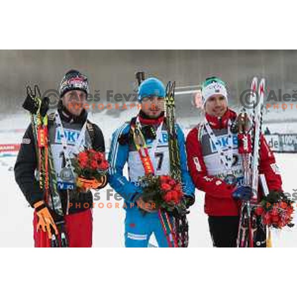 Dominik Landertinger, Anton Shipulin, Emil Hegle Svendsen during BMW IBU World Cup Biathlon Men 10 km sprint at Pokljuka, Slovenia on December 19, 2014 