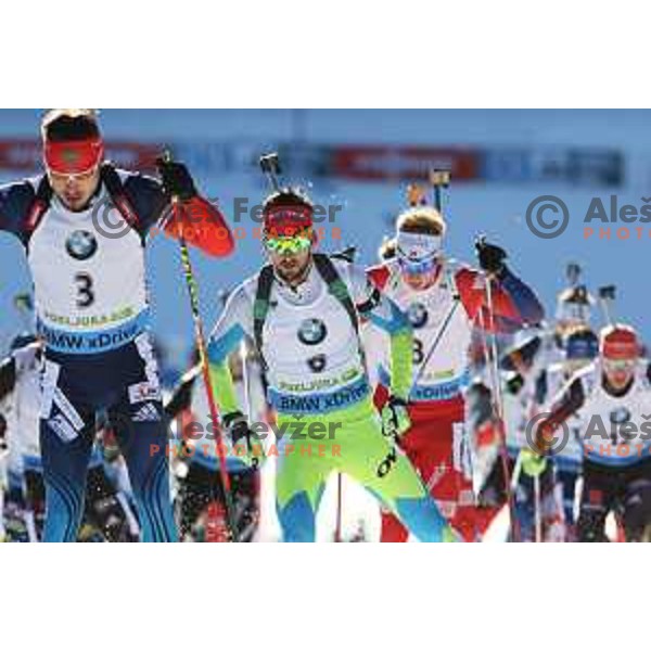Anton Shipulin (RUS) and Jakov Fak (SLO)during BMW IBU World Cup Biathlon, Men Mass Start 15km, Pokljuka, Slovenia, December 21, 2014 