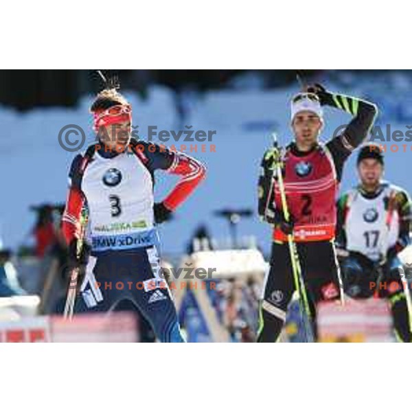 Anton Shipulin (RUS) and Martin Fourcade (FRA) during BMW IBU World Cup Biathlon, Men Mass Start 15km, Pokljuka, Slovenia, December 21, 2014