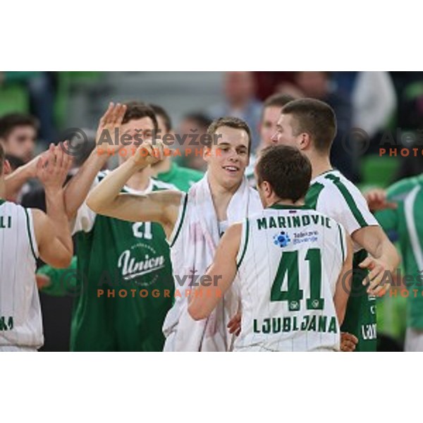 Klemen Prepelic and Dino Muric in action during ABA league basketball match between Union Olimpija and Cibona , played in Stozice Hall, Ljubljana, Slovenia on December 23, 2014