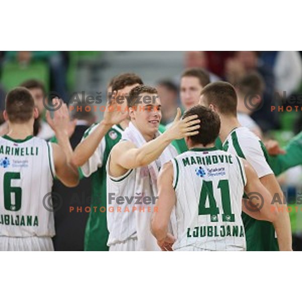 Klemen Prepelic and Dino Muric in action during ABA league basketball match between Union Olimpija and Cibona , played in Stozice Hall, Ljubljana, Slovenia on December 23, 2014