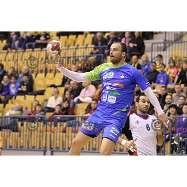 Uros Zorman of Slovenia in action during friendly handball match Slovenia-Egypt , played in Zlatorog Hall, Celje, Slovenia on December 27,2014