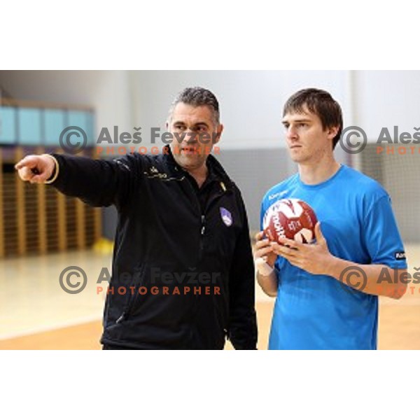 Boris Denic, head coach of Slovenia and Sebastjan Skube in action during practice session in Zrece Sports Hall on January 2, 2015