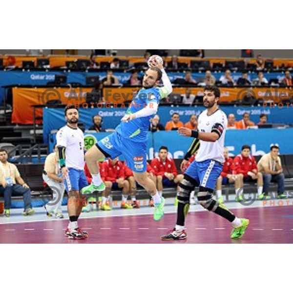 Uros Zorman of Slovenia in action at Preliminary Group A match Slovenia-Chile at Qatar 2015 World Handball championships in Al Saad Sport Arena, Doha on January 16, 2015