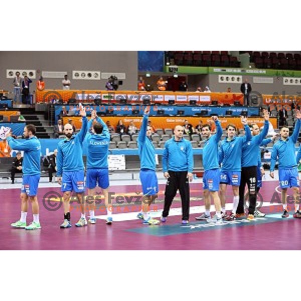 Team of Slovenia in action during Preliminary Group A match Slovenia-Chile at Qatar 2015 World Handball championships in Al Saad Sport Arena, Doha on January 16, 2015