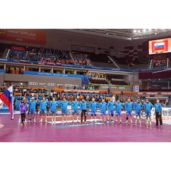 Team of Slovenia in action during Preliminary Group A match Slovenia-Chile at Qatar 2015 World Handball championships in Al Saad Sport Arena, Doha on January 16, 2015