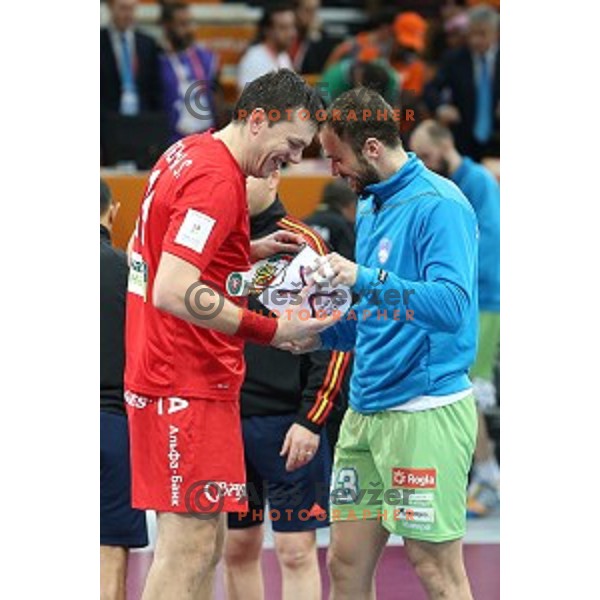 Sergey Rutenka of Belarus and Uros Zorman of Slovenia before Preliminary Group A match Slovenia-Belarus at Qatar 2015 World Handball championships in Lusail Sport Arena, Doha on January 17, 2015