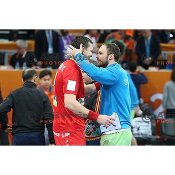 Sergey Rutenka of Belarus and Uros Zorman of Slovenia before Preliminary Group A match Slovenia-Belarus at Qatar 2015 World Handball championships in Lusail Sport Arena, Doha on January 17, 2015