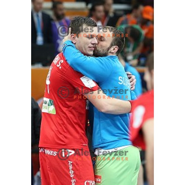 Sergey Rutenka of Belarus and Uros Zorman of Slovenia before Preliminary Group A match Slovenia-Belarus at Qatar 2015 World Handball championships in Lusail Sport Arena, Doha on January 17, 2015