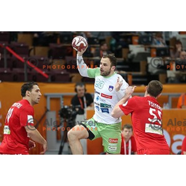 Uros Zorman of Slovenia in action at Preliminary Group A match Slovenia-Belarus at Qatar 2015 World Handball championships in Lusail Sport Arena, Doha on January 17, 2015