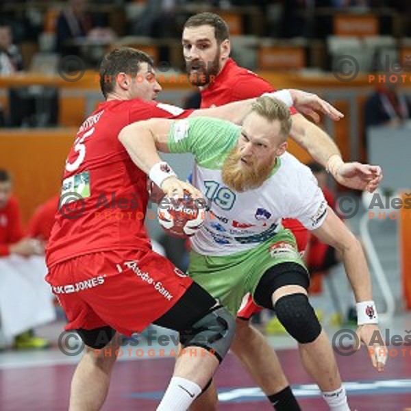 Miha Zvizej of Slovenia in action at Preliminary Group A match Slovenia-Belarus at Qatar 2015 World Handball championships in Lusail Sport Arena, Doha on January 17, 2015