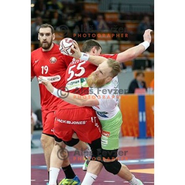 Miha Zvizej of Slovenia in action at Preliminary Group A match Slovenia-Belarus at Qatar 2015 World Handball championships in Lusail Sport Arena, Doha on January 17, 2015