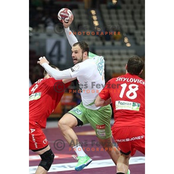 Uros Zorman of Slovenia in action at Preliminary Group A match Slovenia-Belarus at Qatar 2015 World Handball championships in Lusail Sport Arena, Doha on January 17, 2015