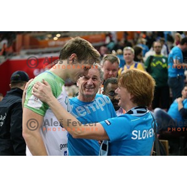 Jure Dolenec of Slovenia with his parents after Preliminary Group A match Slovenia-Belarus at Qatar 2015 World Handball championships in Lusail Sport Arena, Doha on January 17, 2015