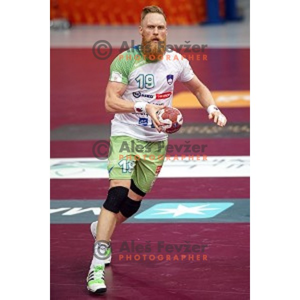 Miha Zvizej of Slovenia in action at Preliminary Group A match Slovenia-Belarus at Qatar 2015 World Handball championships in Lusail Sport Arena, Doha on January 17, 2015