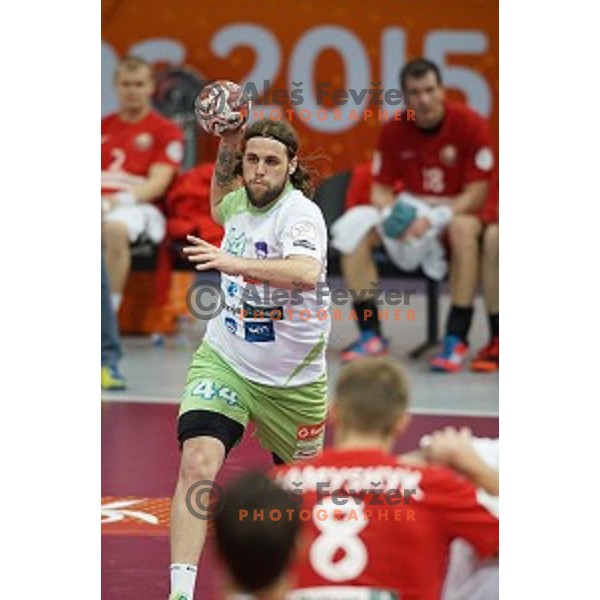 Dean Bombac of Slovenia in action at Preliminary Group A match Slovenia-Belarus at Qatar 2015 World Handball championships in Lusail Sport Arena, Doha on January 17, 2015